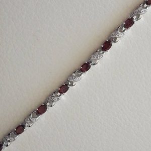 New 6 CTW Garnet & Diamond Infinity Bracelet 12 Oval gemstones. 7.5
