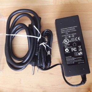 Brand New switching Power Supply Model:YJS05-2402500D Input:100-240V 47-63 Hz 1.5A Output:24.0V 2500mA